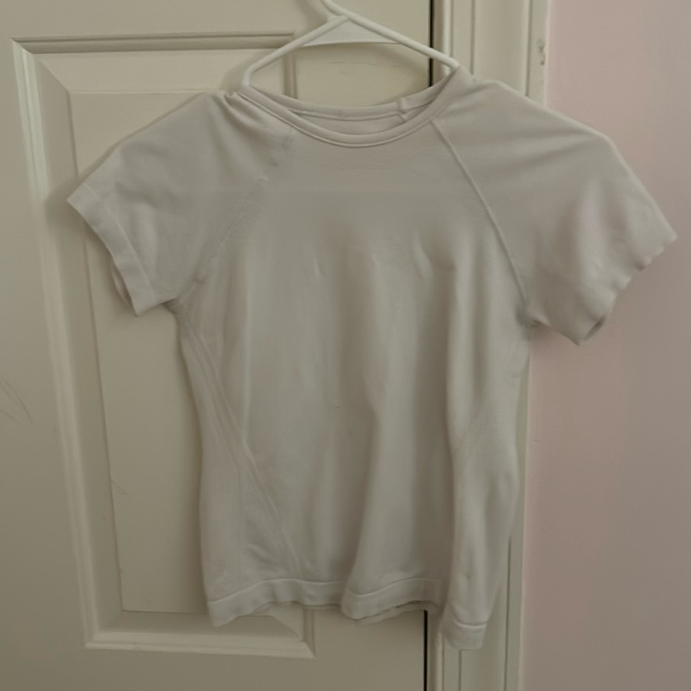 White athletic girl short sleeve top size medium 8 to 10